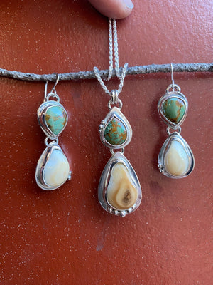 Elk Ivory and Turquoise Pendant - handcrafted Elk Ivory in Sterling Silver by The Jewelry Shop, made in Arizona