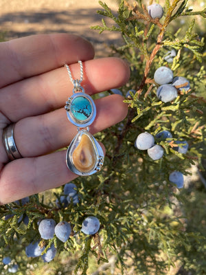 Elk Ivory and Turquoise Pendant - handcrafted Elk Ivory in Sterling Silver by The Jewelry Shop, made in Arizona