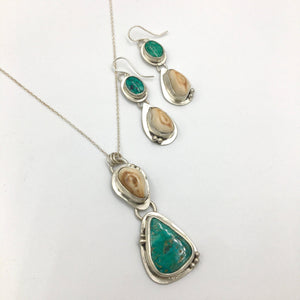 Elk Ivory and Turquoise Pendant - handcrafted Elk Ivory in Sterling Silver by The Jewelry Shop, made in Arizona