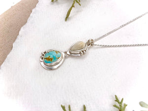 Elk Ivory and Turquoise Pendant - handcrafted Elk Ivory in Sterling Silver by The Jewelry Shop, made in Arizona