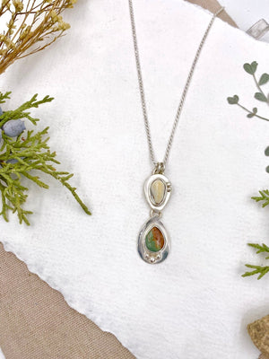 Elk Ivory and Turquoise Pendant - handcrafted Elk Ivory in Sterling Silver by The Jewelry Shop, made in Arizona