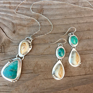 Elk Ivory and Turquoise Pendant - handcrafted Elk Ivory in Sterling Silver by The Jewelry Shop, made in Arizona