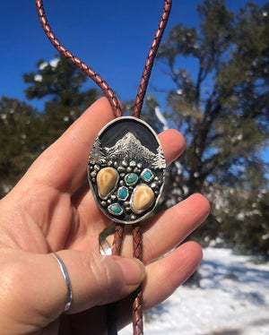 ‘Mountain Boulders’ Custom Bolo Tie - handcrafted Elk Ivory in Sterling Silver by The Jewelry Shop, made in Arizona