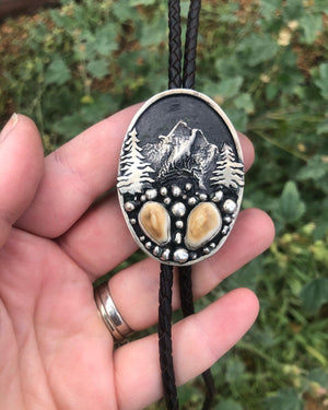 ‘Mountain Boulders’ Custom Bolo Tie - handcrafted Elk Ivory in Sterling Silver by The Jewelry Shop, made in Arizona