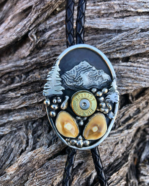 ‘Mountain Boulders’ Custom Bolo Tie - handcrafted Elk Ivory in Sterling Silver by The Jewelry Shop, made in Arizona