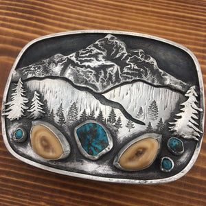 ‘Mountain Boulders’ Belt Buckle - handcrafted Elk Ivory in Sterling Silver by The Jewelry Shop, made in Arizona