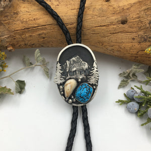 ‘Mountain Boulders’ Custom Bolo Tie - handcrafted Elk Ivory in Sterling Silver by The Jewelry Shop, made in Arizona